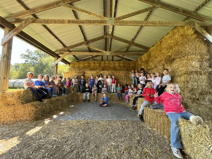 image-1012988-2024_Kindergarden_field_trip_Sitting_on_straw_bales_Smaller-45c48.jpg